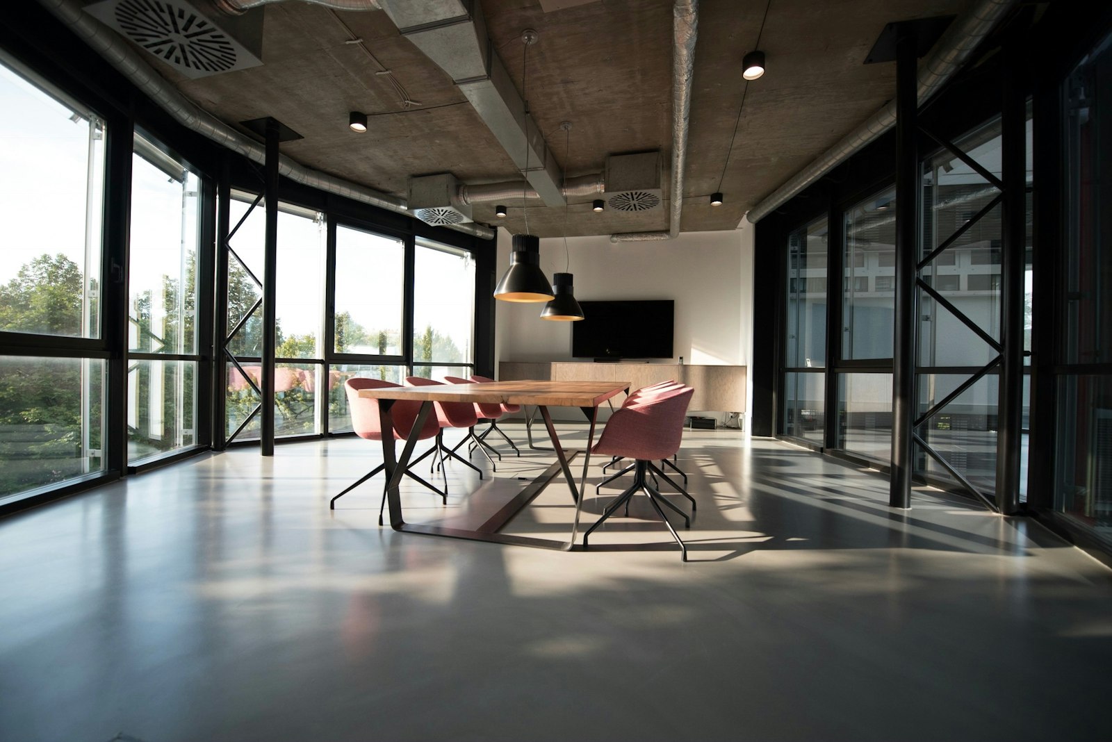 Luxury office corridor with glass partitions